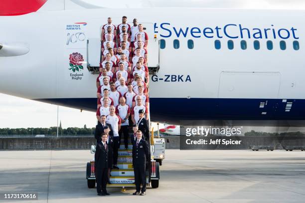 England Rugby's 31 man squad line up in front of their British Airways 'Sweet Chariot' that will fly them to Tokyo, at Heathrow Airport on September...