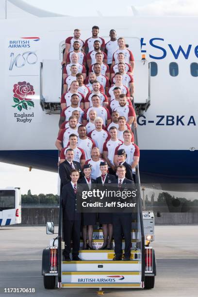 England Rugby's 31 man squad line up in front of their British Airways 'Sweet Chariot' that will fly them to Tokyo, at Heathrow Airport on September...