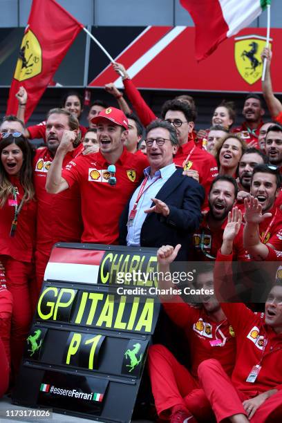 Race winner Charles Leclerc of Monaco and Ferrari celebrates with Ferrari CEO Louis C. Camilleri and his team after the F1 Grand Prix of Italy at...