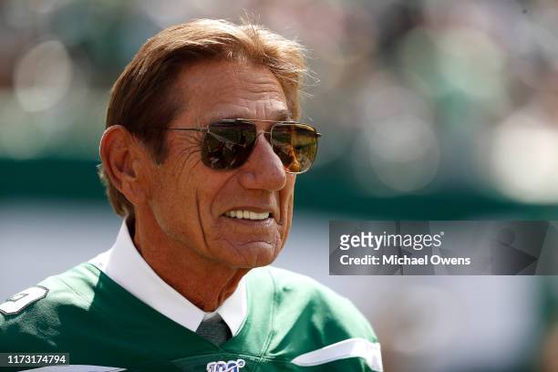 Hall of Famer Joe Namath leaves the field during the first quarter at a game between the New York Jets and the Buffalo Bills at MetLife Stadium on...