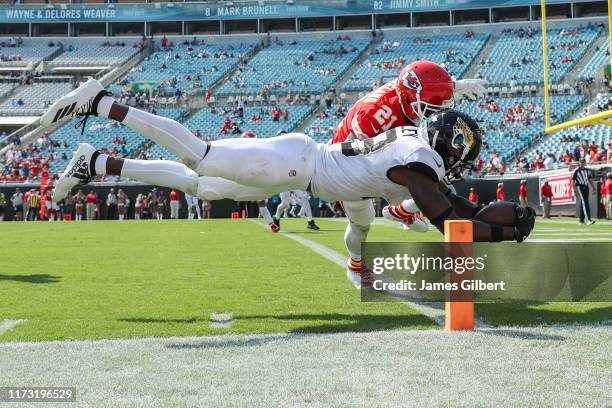 Chris Conley of the Jacksonville Jaguars scores a touchdown in the second half against Bashaud Breeland of the Kansas City Chiefs at TIAA Bank Field...