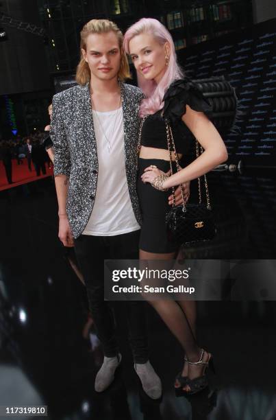 Wilson Gonzalez Ochsenknecht and his girlfiend Bonnie Strange attend the "Transformers 3" European premiere on June 25, 2011 in Berlin, Germany.