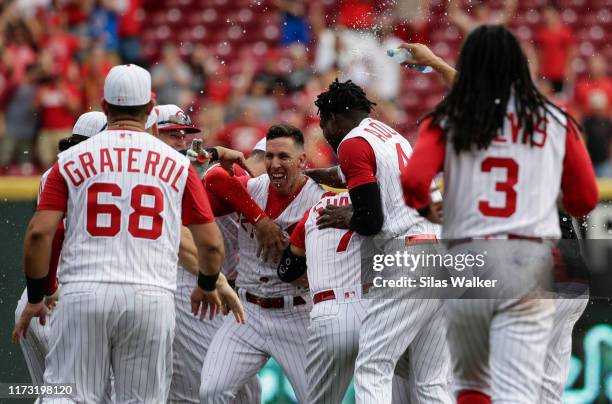 Michael Lorenzen of the Cincinnati Reds celebrates hitting the game winning double against the Arizona Diamondbacks during the ninth inning at Great...