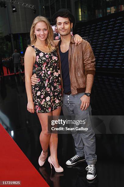 Actor Sebastian Koenig and his girlfriend Jil Funke the "Transformers 3" European premiere on June 25, 2011 in Berlin, Germany.