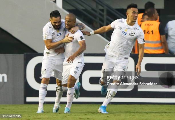 Felipe Jonatan, Carlos Sanchez and Uribe celebrate their first goal during the match against Athletico PR for the Brasileirao Series A 2019 at Vila...