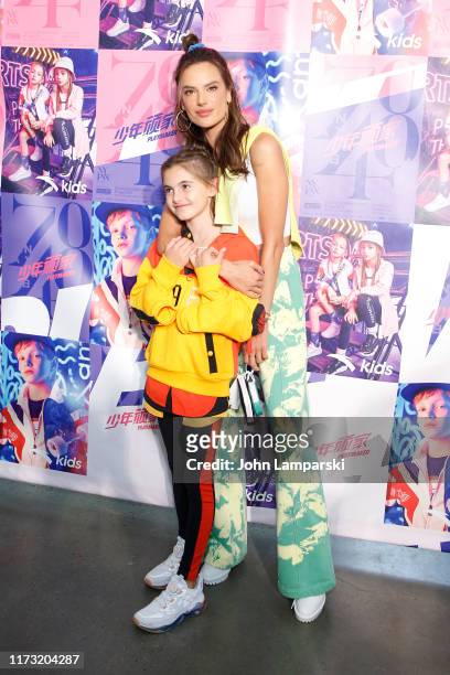 Alessandra Ambrosio and her daughter Anja Louise Ambrosio Mazur pose backstage for China Day: Anta Kids during New York Fashion Week: The Shows on...