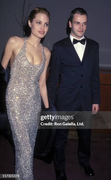 Actress Angelina Jolie and actor Johnny Lee Miller attend the Miramax Party for 56th Annual Golden Globe Awards on January 24, 1999 at the Beverly...