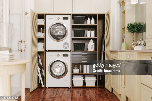 intérieur d'une buanderie moderne - washing machine photos et images de collection