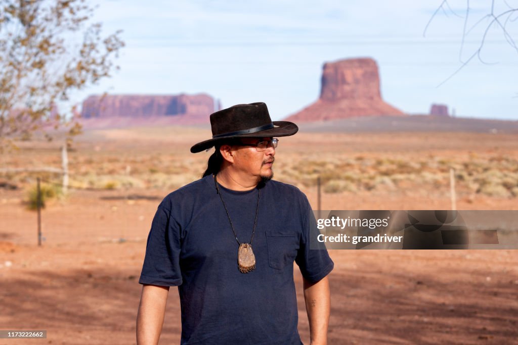 Young Adult Native American Navajo Man Outside in Monument Valley Arizona