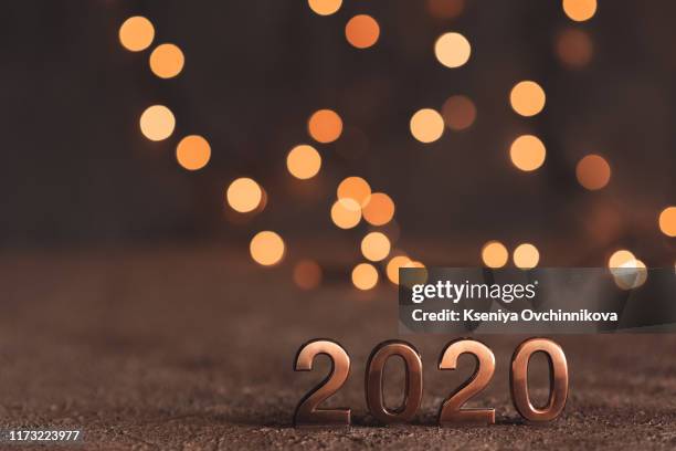 happy new year 2020 word made from sparkler light firework - new year 2020 stock pictures, royalty-free photos & images