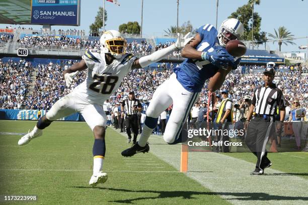 Devin Funchess of the Indianapolis Colts can't come down with the catch while pursued by Brandon Facyson of the Los Angeles Chargers in the fourth...