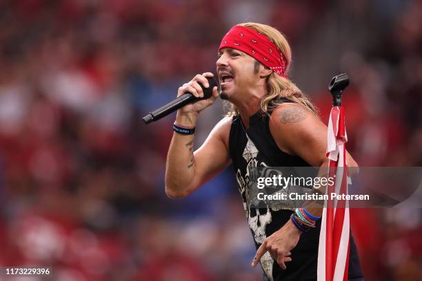 Musician Bret Michaels performs during a half-time show at the NFL game between the Arizona Cardinals # of the Arizona Cardinals and the Detroit...