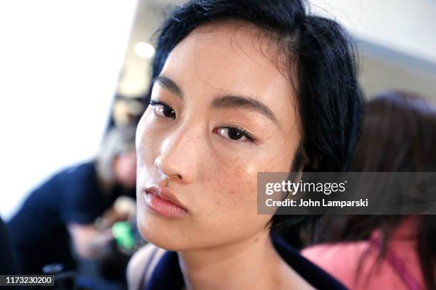 Model prepares backstage for China Day: Lily during New York Fashion Week: The Shows on September 08, 2019 in New York City.