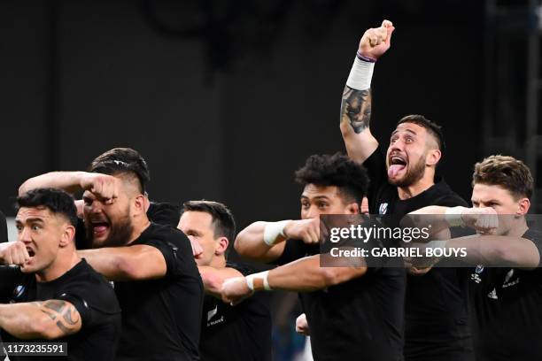 The All Blacks perform the Haka facing their Canadian opponents prior to kick off in the Japan 2019 Rugby World Cup Pool B match between New Zealand...