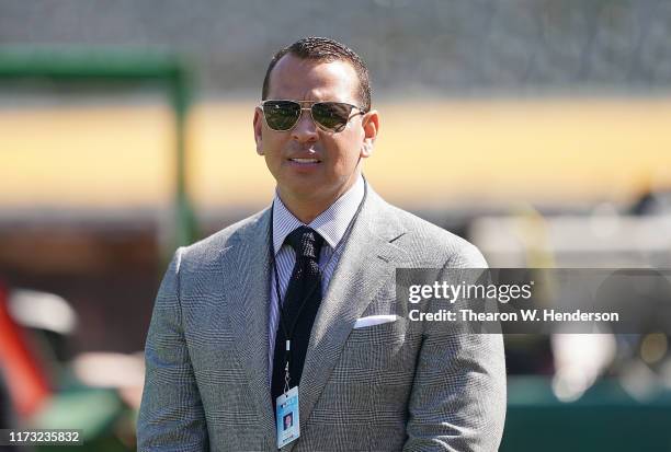 Baseball analyst and former player Alex Rodriguez looks on during batting practice prior to the start of the American League WildCard Game between...