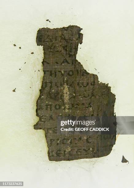 Fragment of Herculaneum scroll, is pictured at Diamond Light Source in Didcot, west of London on September 30, 2019. - Researchers have been using...