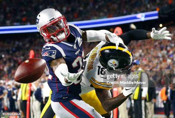 Jonathan Jones of the New England Patriots defends a pass intended for Diontae Johnson of the Pittsburgh Steelers during the second half at Gillette...