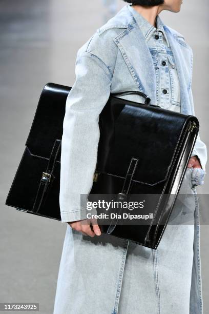 Model, bag detail, walks the runway for China Day: Lily during New York Fashion Week: The Shows on September 08, 2019 in New York City.