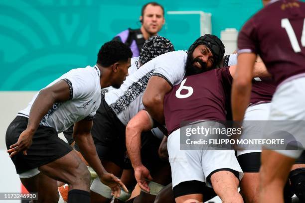 Fiji's flanker Semi Kunatani pushes in a maul during the Japan 2019 Rugby World Cup Pool D match between Georgia and Fiji at the Hanazono Rugby...