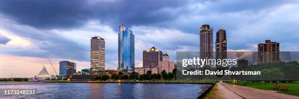 low angle view of milwaukee downtown skyline at sunset - milwaukee, wisconsin, usa - milwaukee stock pictures, royalty-free photos & images