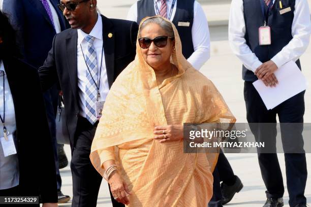 Bangladesh's Prime Minister Sheikh Hasina arrives at Indira Gandhi International Airport in New Delhi on October 3 at the start of an official visit.