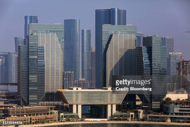 The Abu Dhabi Global Market Authorities building, center, stands among commercial and residential properties on Al Maryah Island in Abu Dhabi, United...