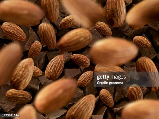 almonds and chocolate - almond stock pictures, royalty-free photos & images