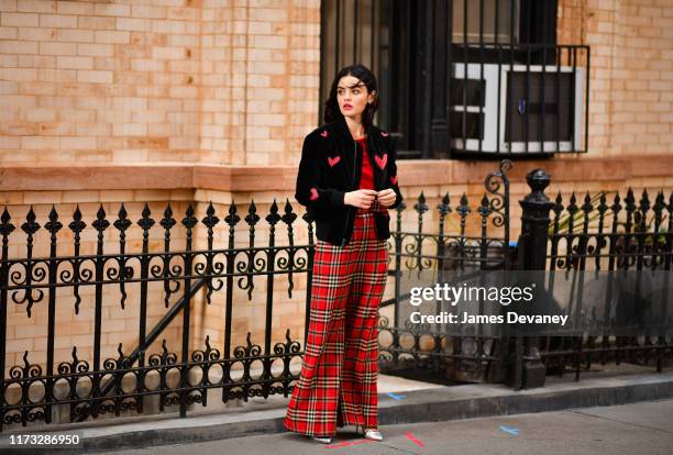 Lucy Hale seen filming on location for 'Katy Keene' on the streets of Brooklyn on October 2, 2019 in New York City.
