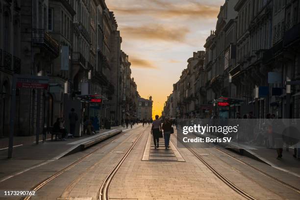 sunset in downtown bordeaux - bordeaux street stock pictures, royalty-free photos & images