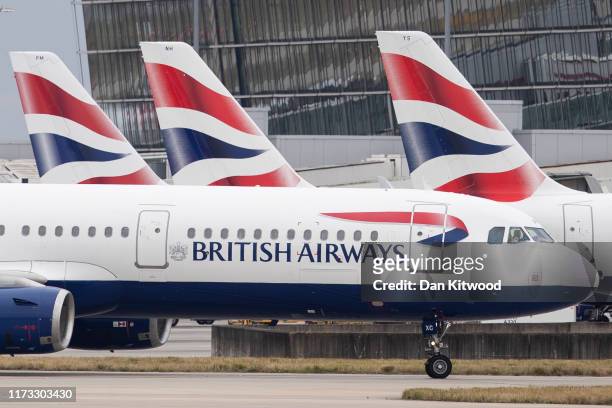 British Airways plane taxies after landing at Heathrow's Terminal 5 on September 9, 2019 in London, England. British Airways pilots have begun a 48...