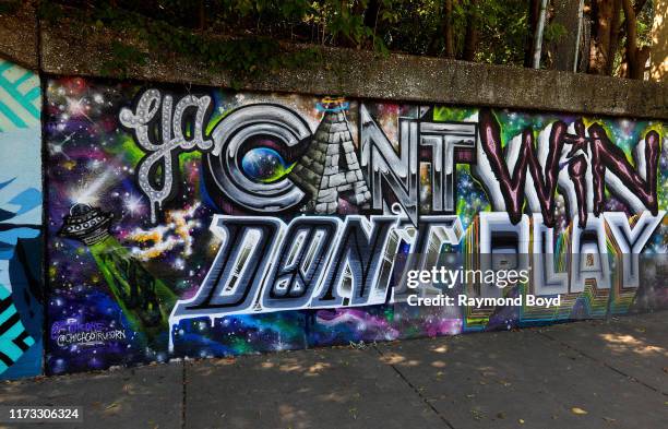 Stuk One's 'Ya Can't Win Don't Play' mural is displayed in the West Town neighborhood in Chicago, Illinois on September 8, 2019. MANDATORY MENTION OF...