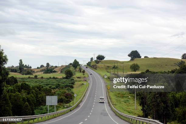 winding road near castro, chiloe island, chile - castro chiloé island stock pictures, royalty-free photos & images