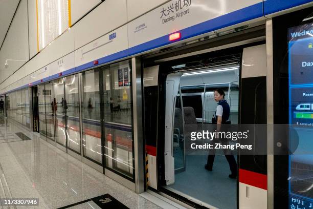 Train waits at the platform of Daxing airport station. Beijing Metro Daxing airport line, with a total length of 41 kilometers and a speed of 160...