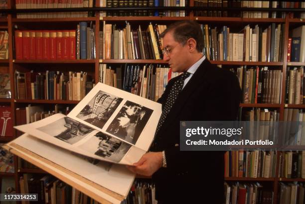 Manager and Member of Parliament Marcello Dell'Utri during a photo shoot in the library of his home. Milan, Italy. 1996