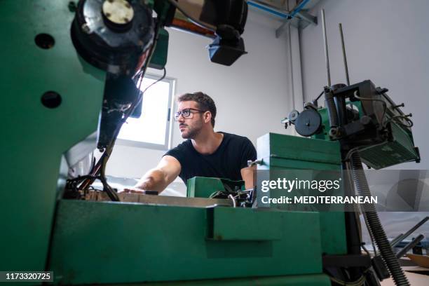 offset printer man with 2 colors printer - offset press stock pictures, royalty-free photos & images