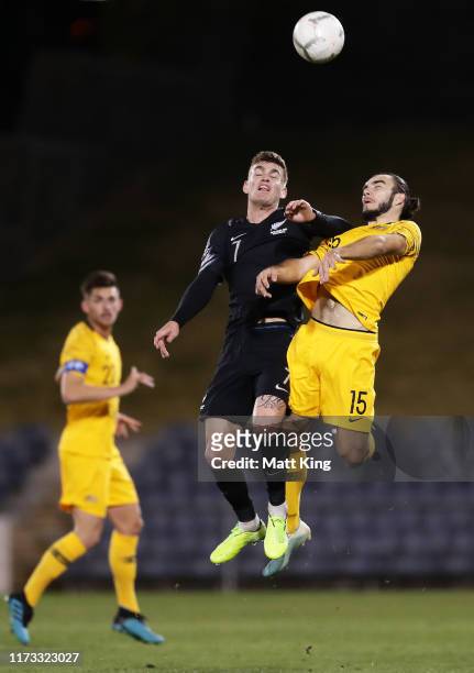 Myer Bevan of New Zealand competes for the ball against Nick D’agostino of Australia during the International Friendly Match between the Australian...