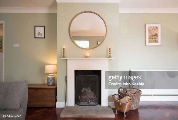 property interiors - candle lit living room stock pictures, royalty-free photos & images