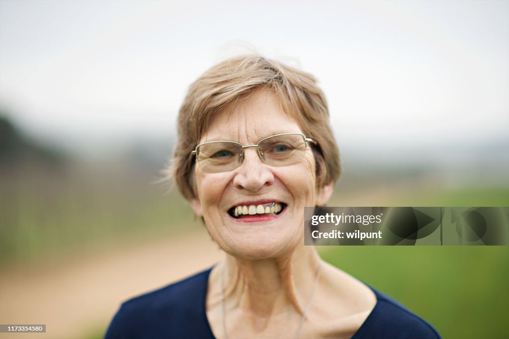 Seniors Woman Portrait outdoors 70-79 years with eyeglasses