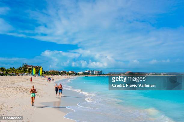 turks and caicos, providenciales - grace bay beach - providenciales stock pictures, royalty-free photos & images