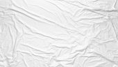 White wrinkled fabric texture. Paste poster template. Glued paper or fabric mockup.