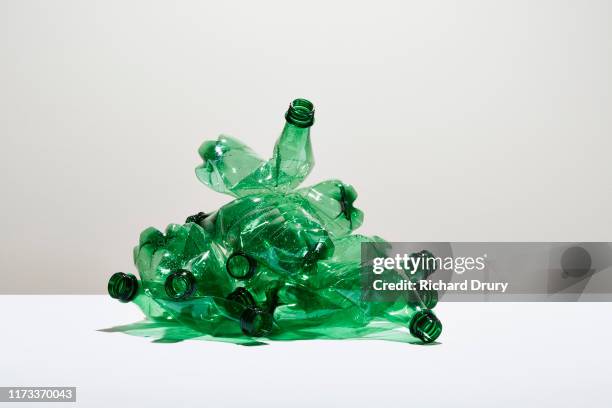 a heap of disposable water bottles - plastic pollution stock pictures, royalty-free photos & images