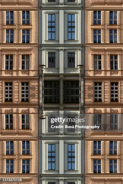 kaleidoscopic image of facade of old residential building in berlin, germany - digital era stock-fotos und bilder