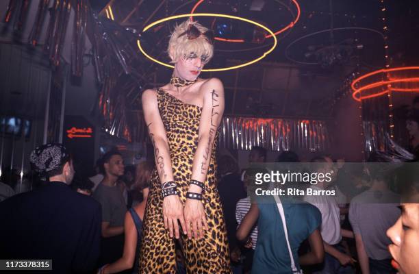 In a one-shoulder, leopard print outfit, drag performer Tabboo poses on the dancefloor at Bentley's nightclub, New York, New York, 1988.