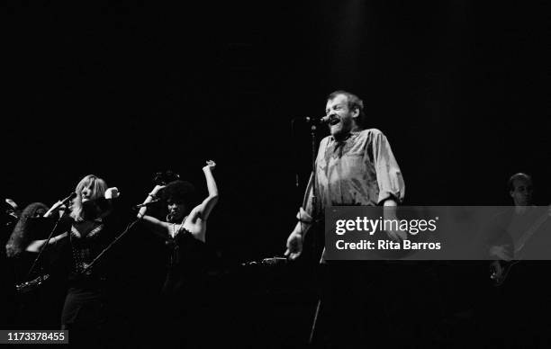 English Rock and R&B singer Joe Cocker performs on stage at the Beacon Theater, New York, New York, November 25, 1987.