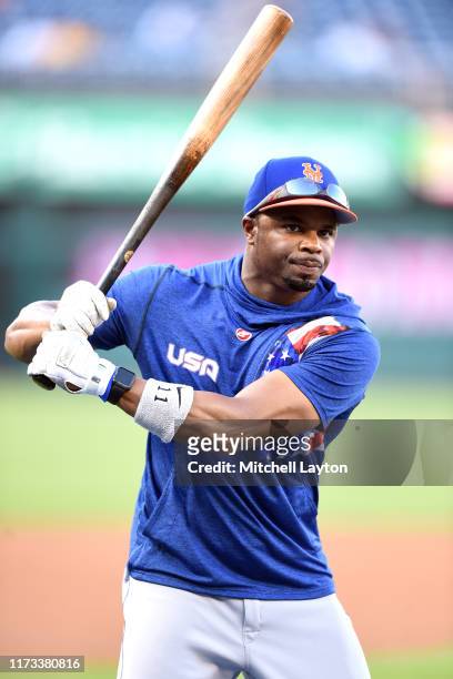 Rajai Davis of the New York Mets looks on during batting practice of a baseball game against the Washington Nationals at Nationals Park on September...