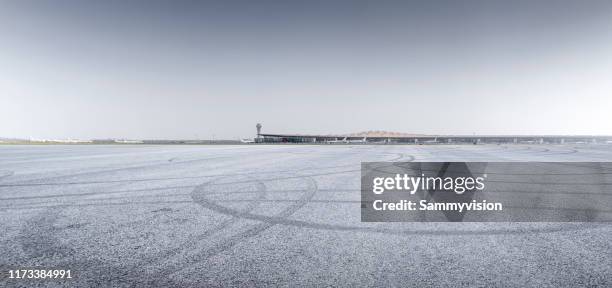 airport tarmac against terminal station - control tower stock pictures, royalty-free photos & images