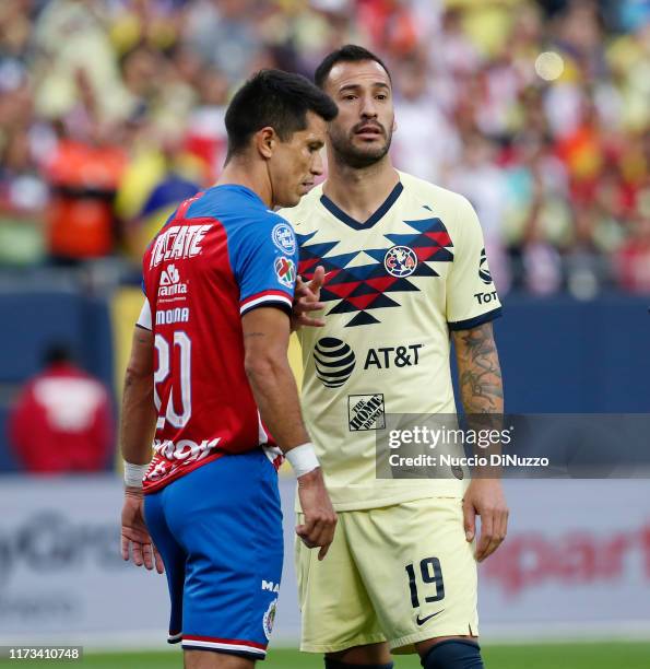 Emmanuel Aguilera of Club America and Jesus Molina of Chivas de Guadalajara line up for a corner kick during the Super Clasico game at Soldier Field...