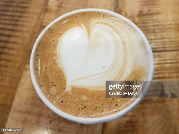 close-up of caffe latte, coffee with milk in the shape of a heart - milk full frame stock pictures, royalty-free photos & images