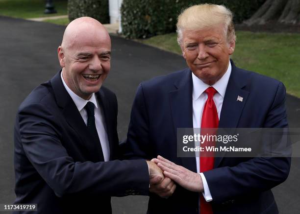 President Donald Trump and FIFA President Gianni Infantino speak to members of the press following a meeting at the White House on September 09, 2019...