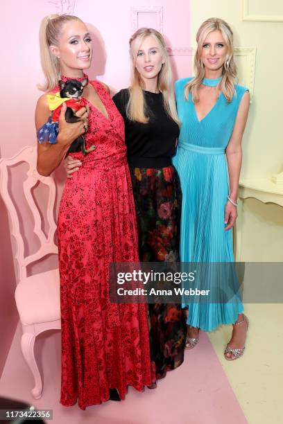 Paris Hilton, Tessa Hilton, and Nicky Hilton attend the alice + olivia by Stacey Bendet Spring 2020 Fashion Presentation at Root Studio on September...